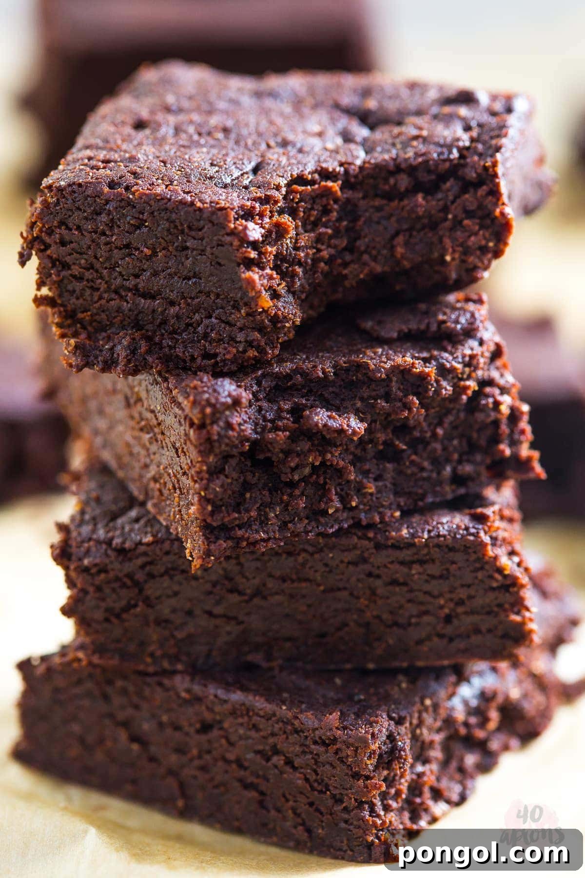 Decadent Fudgy Brownies, Naturally Sweetened 2 Rich, fudgy healthy brownies, free from refined sugar and flour, cooling on a rack