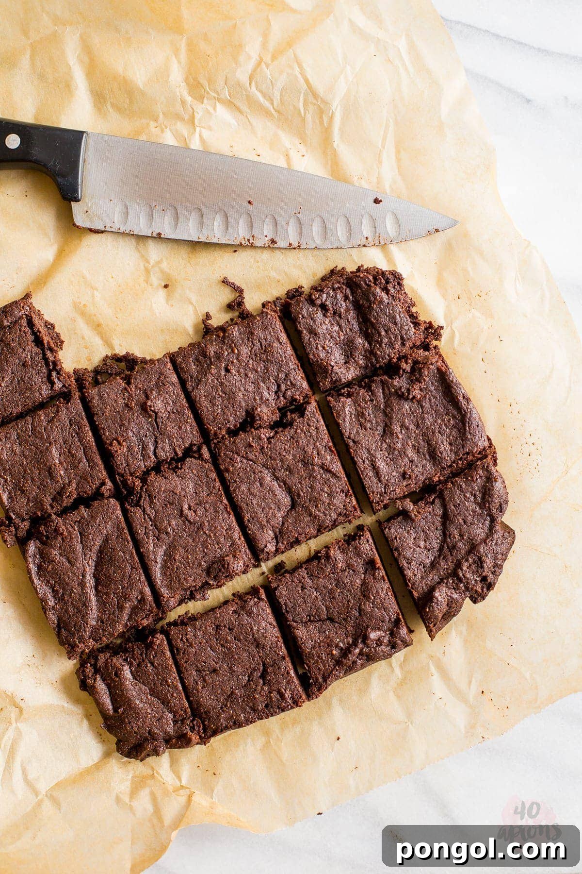 Decadent Fudgy Brownies, Naturally Sweetened 3 Close-up of a single perfect healthy fudgy brownie, showcasing its dense texture