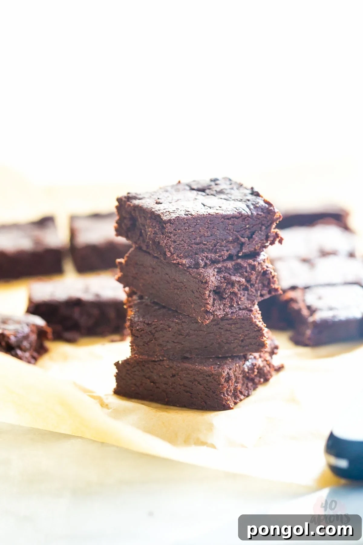 Decadent Fudgy Brownies, Naturally Sweetened 4 Batch of healthy fudgy brownies cut into squares, ready to be served