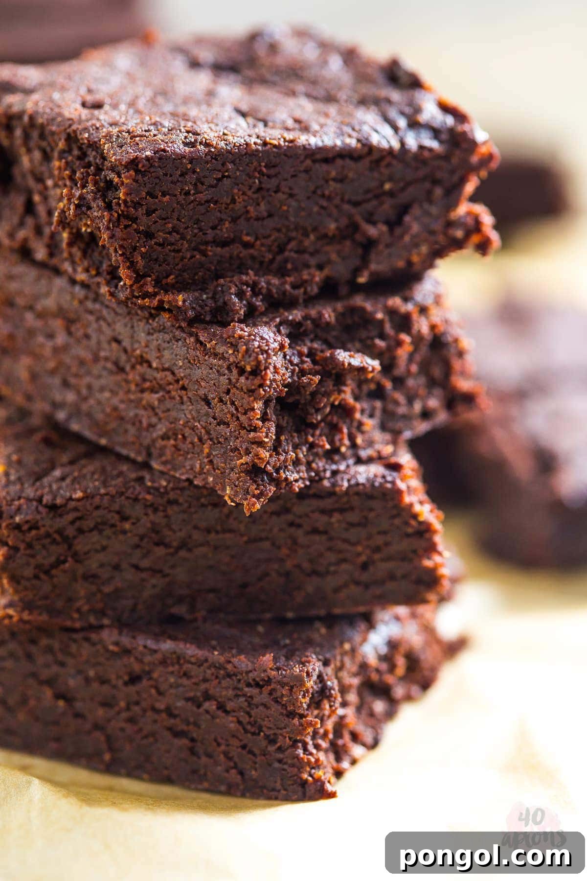 Decadent Fudgy Brownies, Naturally Sweetened 6 Healthy fudgy brownies with a perfect crackled top, sliced and ready to serve