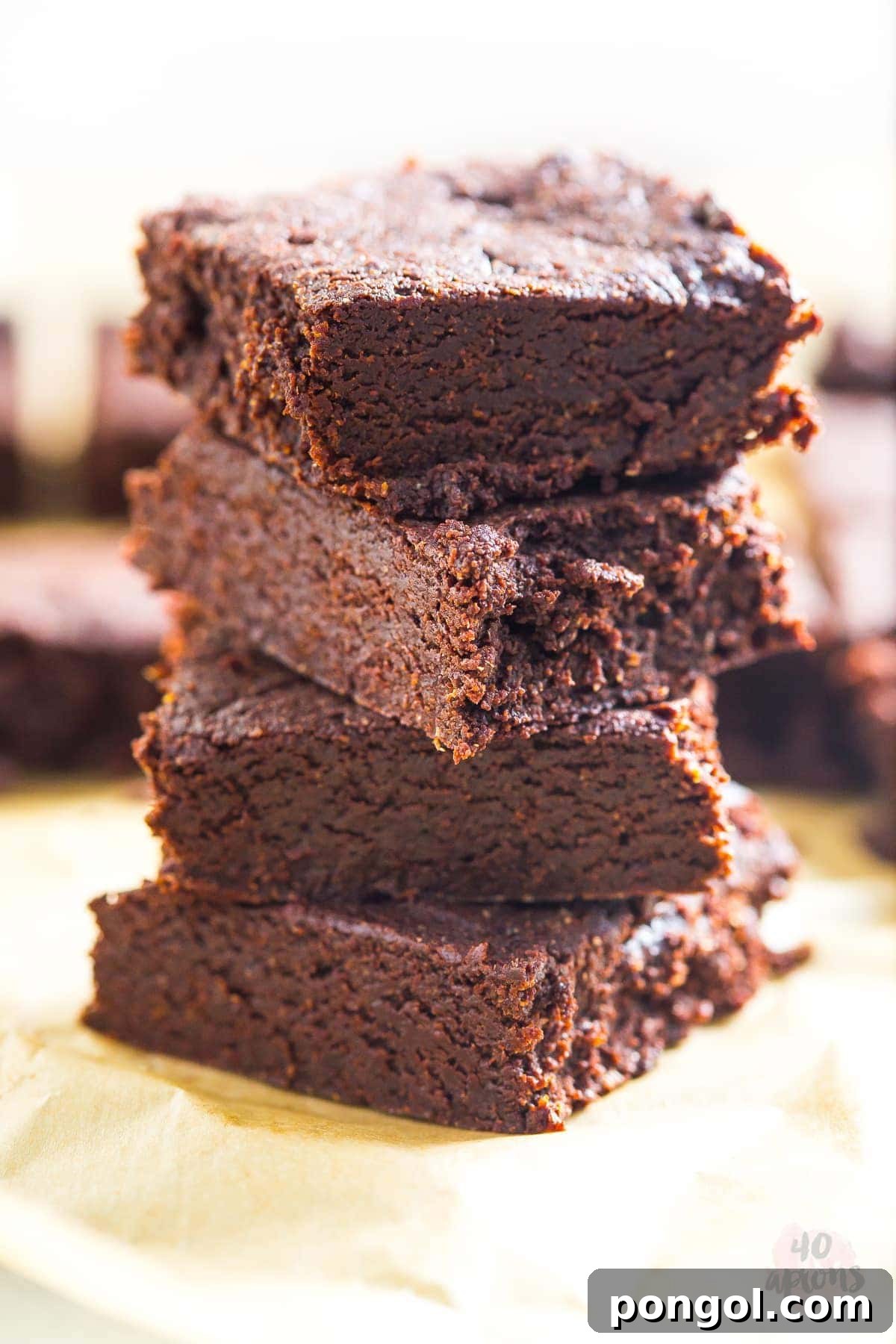Decadent Fudgy Brownies, Naturally Sweetened 8 Freshly baked healthy fudgy brownies cooling in the pan, waiting to be sliced