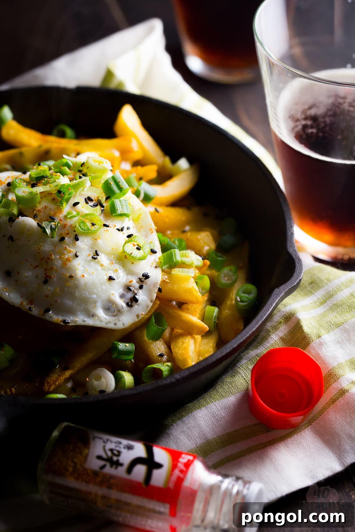 Golden Japanese Curry Fries 2 Japanese curry fries. Definition of epic. Rich, spiced Japanese curry sauce smothers crispy fries, topped with an egg over easy. Mama. // 40 Aprons