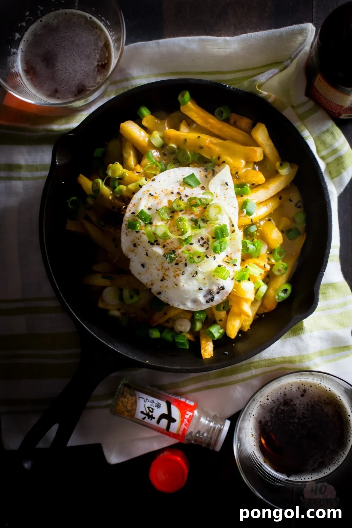 Golden Japanese Curry Fries 3 Japanese curry fries. Definition of epic. Rich, spiced Japanese curry sauce smothers crispy fries, topped with an egg over easy. Mama. // 40 Aprons