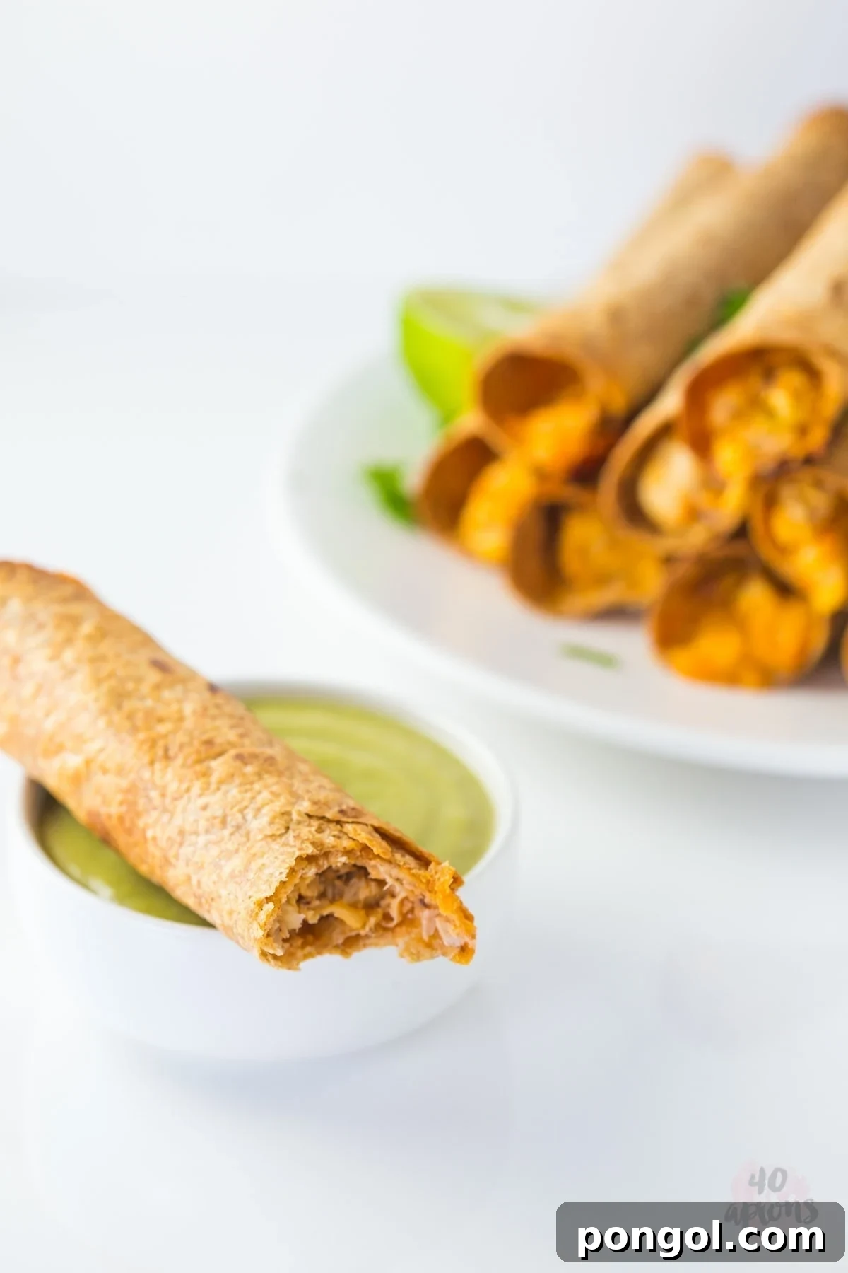 Whole Wheat Cheesy Chicken Taquitos with Creamy Avocado Salsa 6 Cheesy chicken taquitos with avocado salsa (whole wheat!) // 40 Aprons
