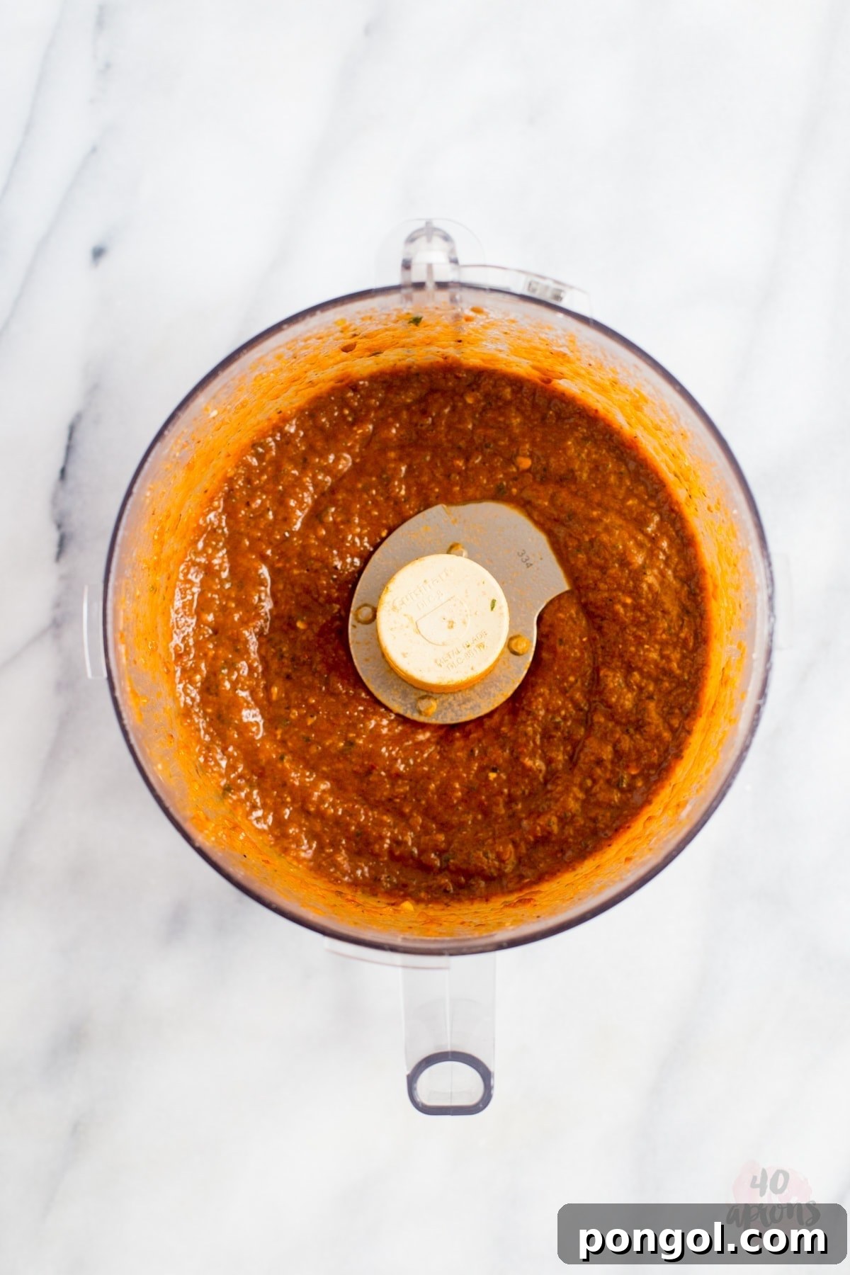 A bowl of Tofu Sofritas showing the rich, dark sauce and crumbled tofu texture. | 40 Aprons