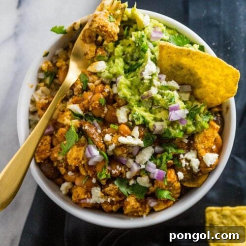 Tofu Sofritas Bowl - spicy, smoky, and totally vegetarian (and vegan!). You won't miss the meat. | 40 Aprons