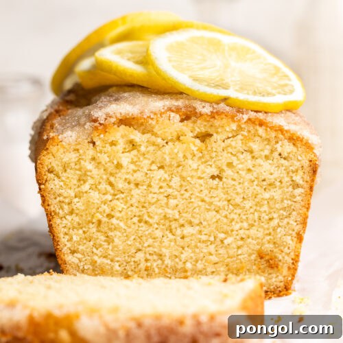Close-up of lemon drizzle cake taken from end to show inside texture of cake.