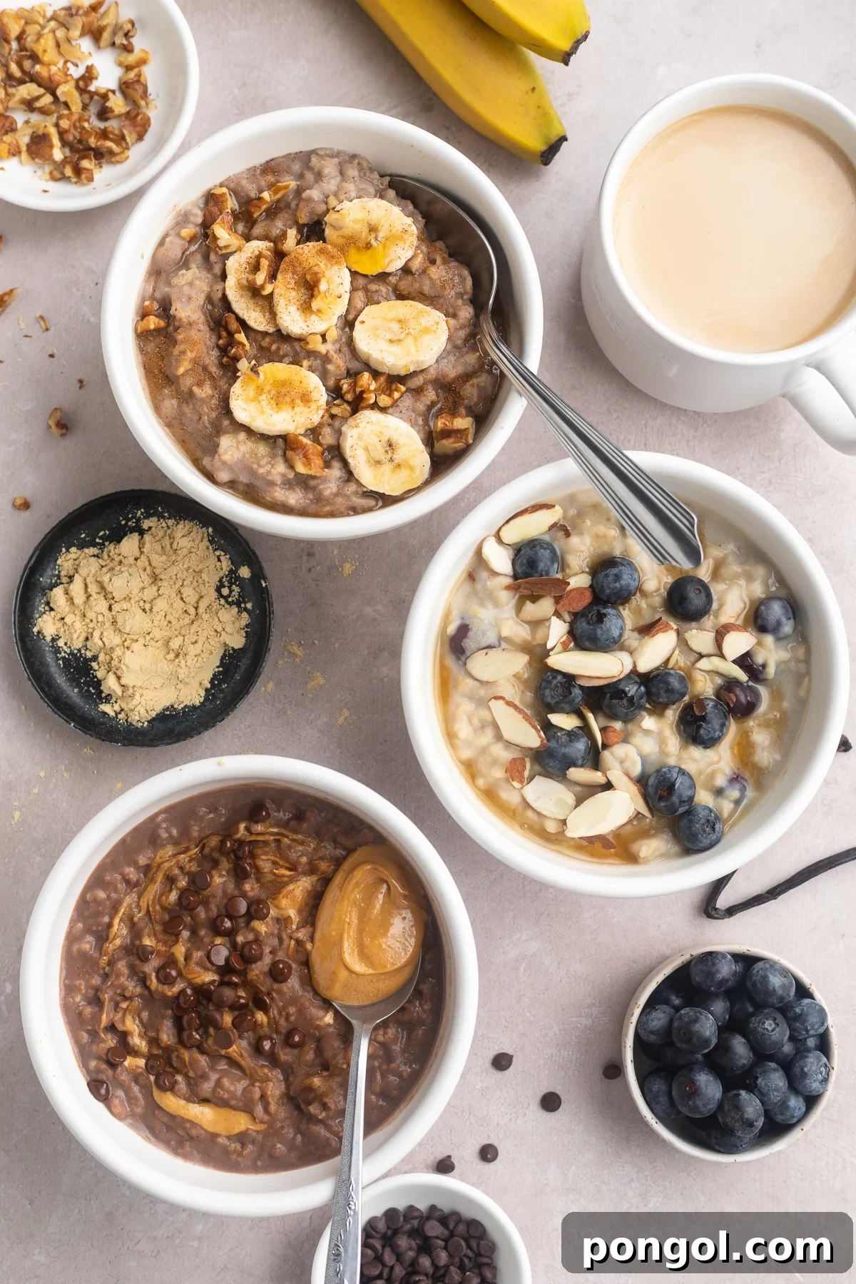 Protein Power Bowls: 3 Creative Oat Recipes 2 Overhead view of 3 different flavors of protein oatmeal, each in a small white ramekin on a neutral tabletop.