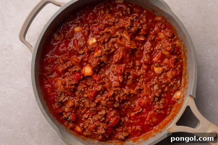 Irresistible Gluten-Free Lasagna 7 Ground beef in marinara sauce for gluten-free lasagna.